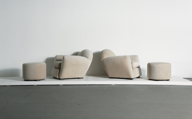 /products/superb-pair-of-round-leaning-club-chairs-and-ottomans-in-alpaca