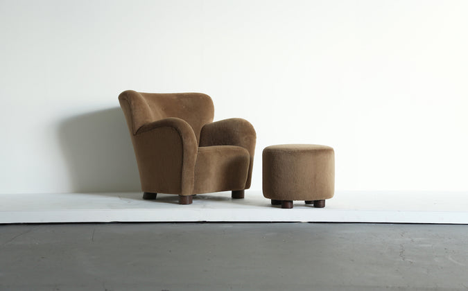 /products/pair-of-lounge-chairs-armchairs-and-ottomans-upholstered-in-pure-alpaca