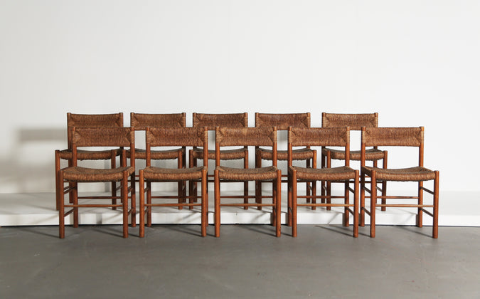 /products/set-of-10-charlotte-perriand-robert-sentou-dordogne-chairs-france-1960s