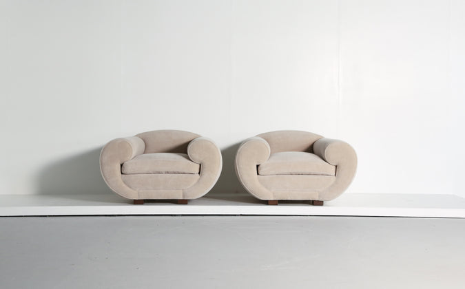 /products/pair-of-jean-royere-style-armchairs-upholstered-in-pure-alpaca