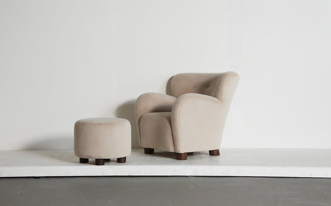 /products/a-lounge-chair-armchair-and-ottoman-upholstered-in-pure-ivory-alpaca