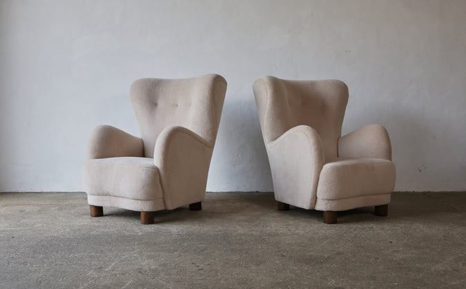 /products/a-pair-of-high-back-arm-chairs-upholstered-in-pure-alpaca
