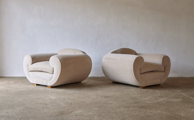/products/pair-of-jean-royere-style-armchairs-upholstered-in-pure-alpaca